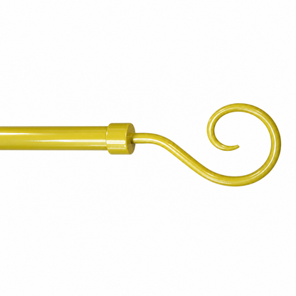 A close-up of a yellow metal curtain rod end with a decorative spiral hook on a plain white background.
