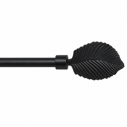 Metal curtain rod with a leaf on a white background