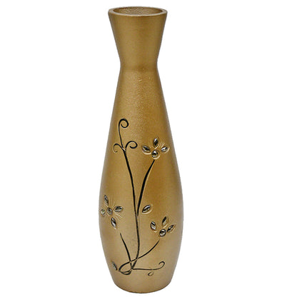 A tall, narrow decorative vase with a flared neck, featuring a textured metallic gold finish and a black floral vine pattern with small raised silver flower details, set against a plain white background.